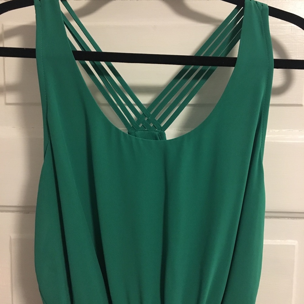 Green dress with strapped detailing